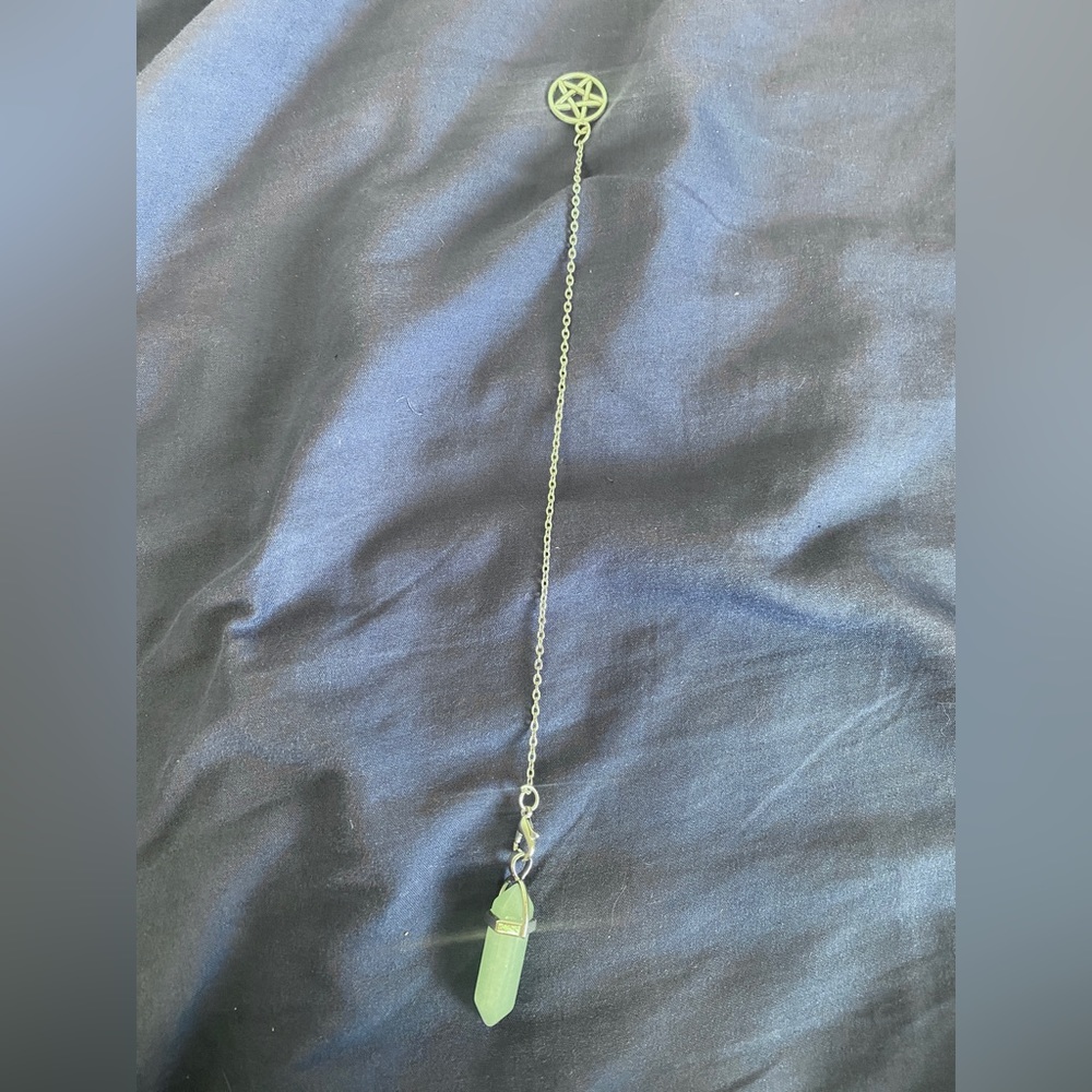 Silver pendulum with crystal and satanic star
